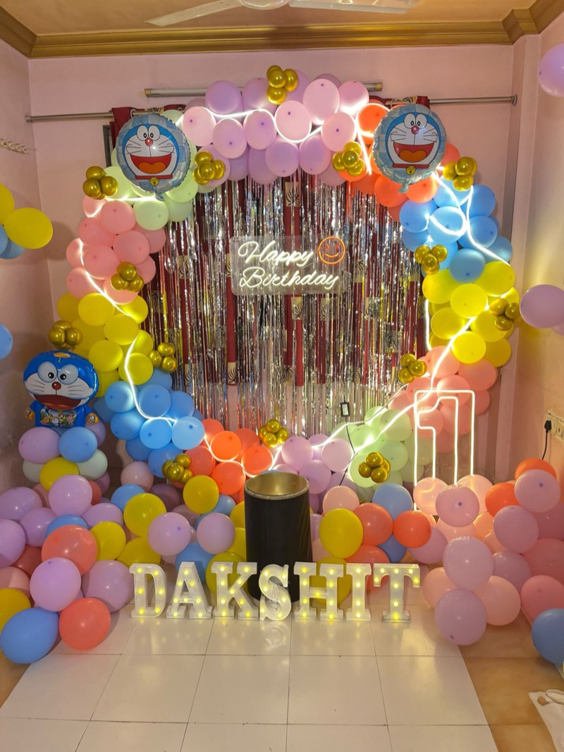 Pastel rainbow balloon ring with LED lighting, Doraemon foil balloons and light-up name letters